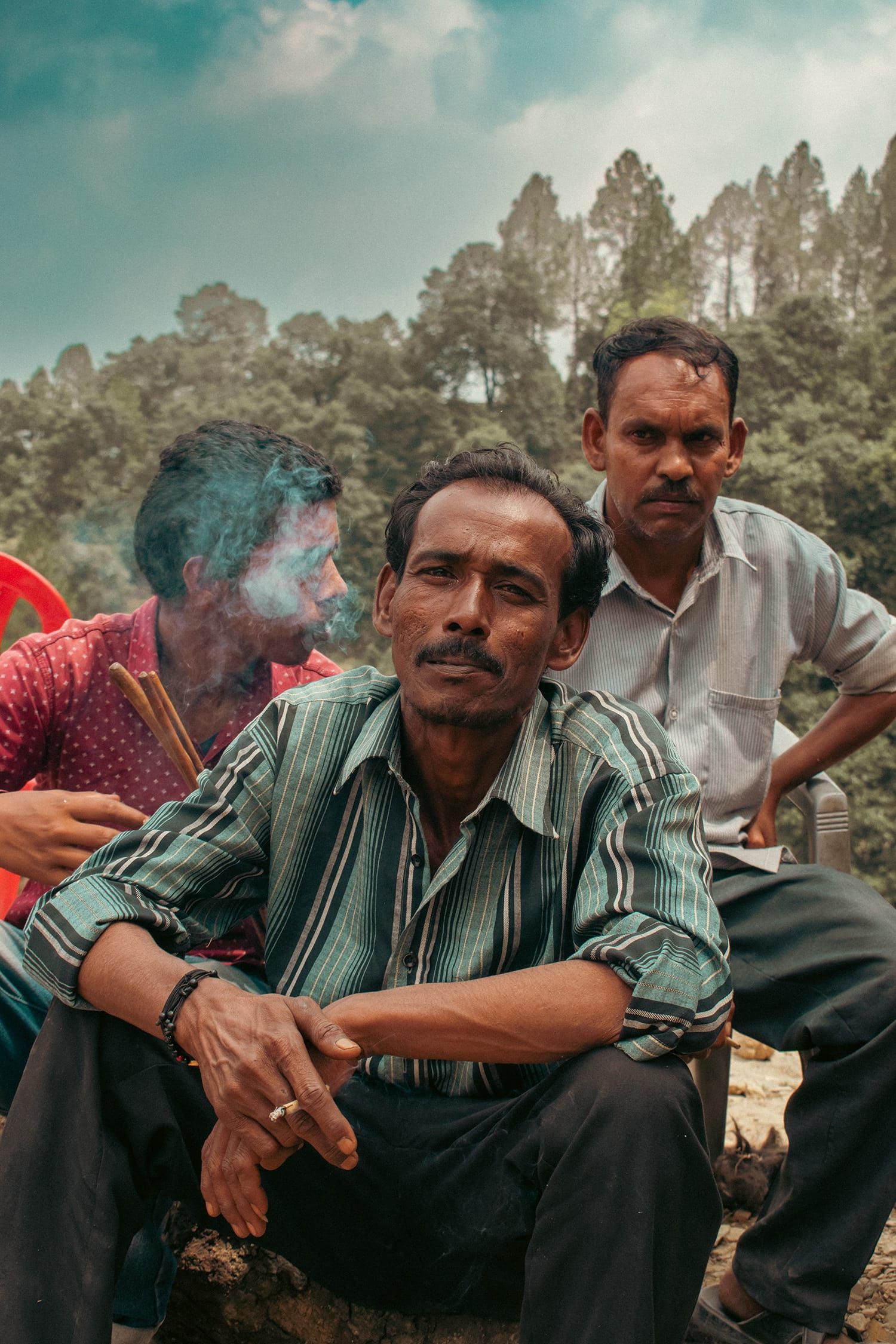 A group of men wearing shirts